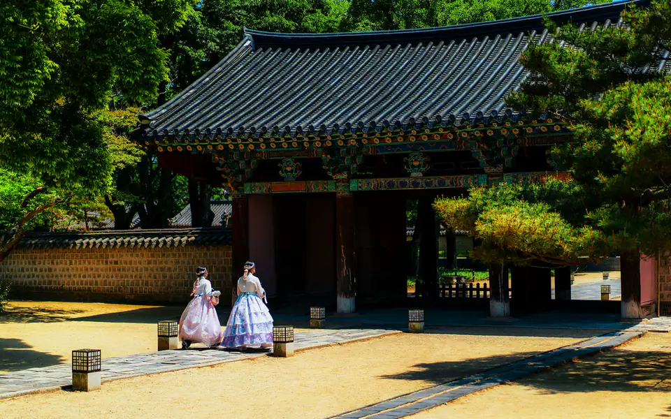 Two women walking down a lane of hanok — Jeonju Hanok Village